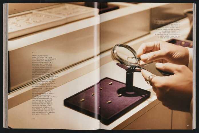 Canadian jewellery regulations — jeweller inspecting a stamped gold ring with a loupe