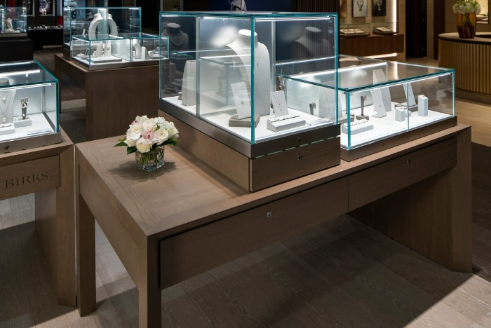 Maison Birks store interior reflecting Birks Group fiscal 2026 results, with jewellery display cases and watch boutiques