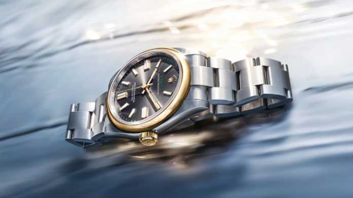 Rolex Oyster 100 years centenary Oyster Perpetual 41 in yellow Rolesor, gold bezel and crown on an Oystersteel case