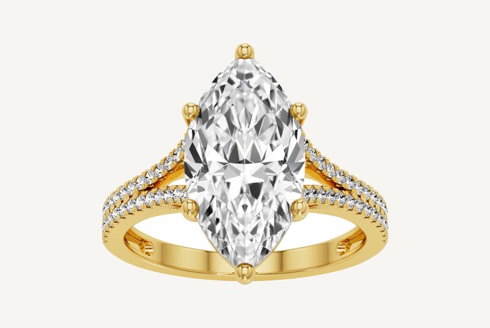 SK Diamonds Time and Shine Toronto marquise cut diamond engagement ring in yellow gold with a split pave shank