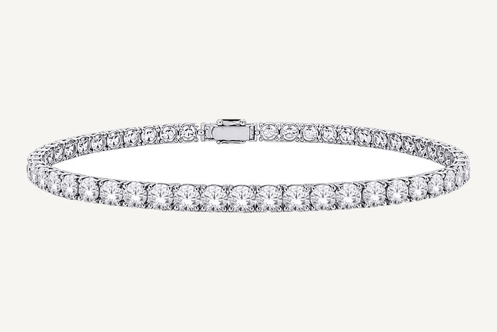 SK Diamonds Time and Shine Toronto round brilliant diamond line bracelet in white gold with four prong settings