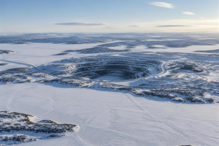 An open pit diamond mine on the frozen Arctic tundra, the landscape of Canadian diamond mines