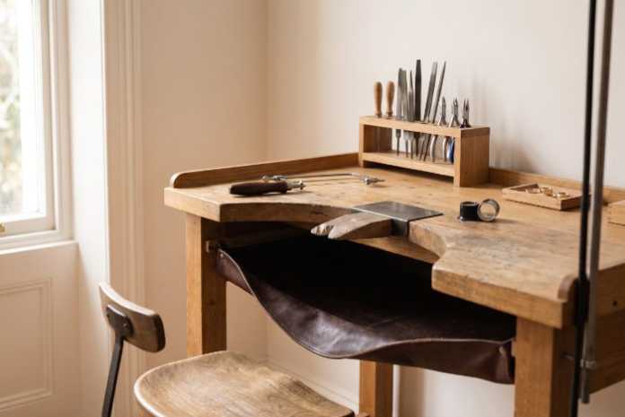 Empty jeweller's workbench and stool, the setting for a jewellery apprenticeship in Canada